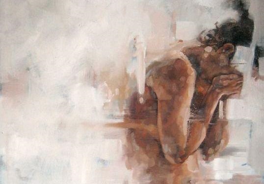 चेहरे को ढकी हुयी महिला